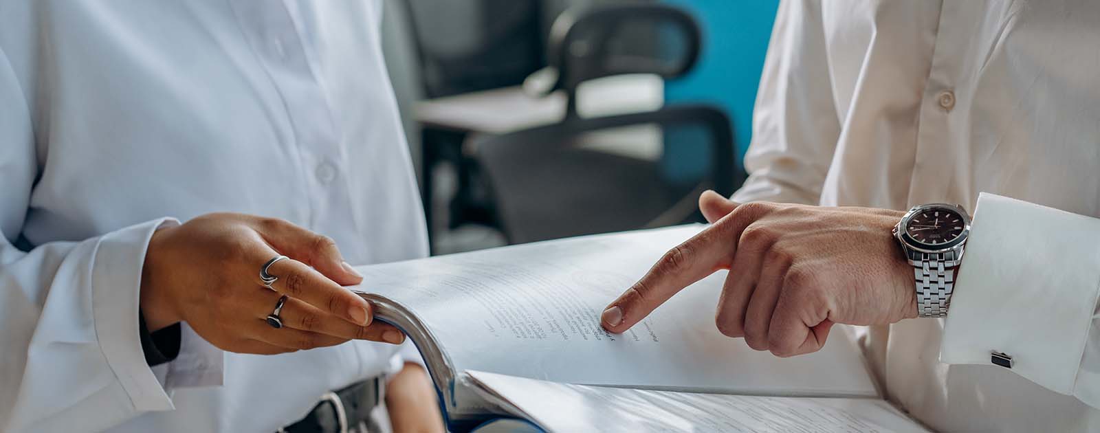 people looking at a report