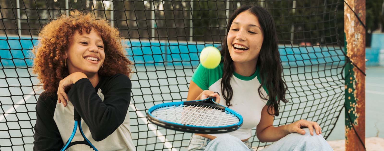 two girls playing sports